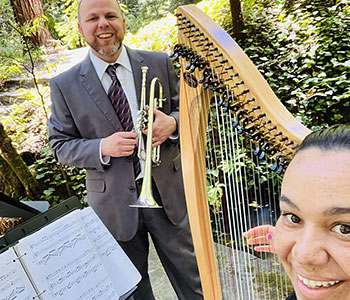 Photo of Aja and Dan at a wedding